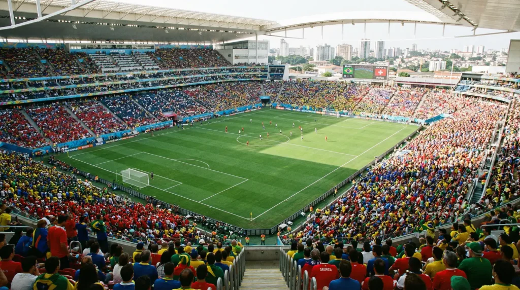 Wide-angle view of a World Cup stadium during a group stage match with full stands and pitch markings visible